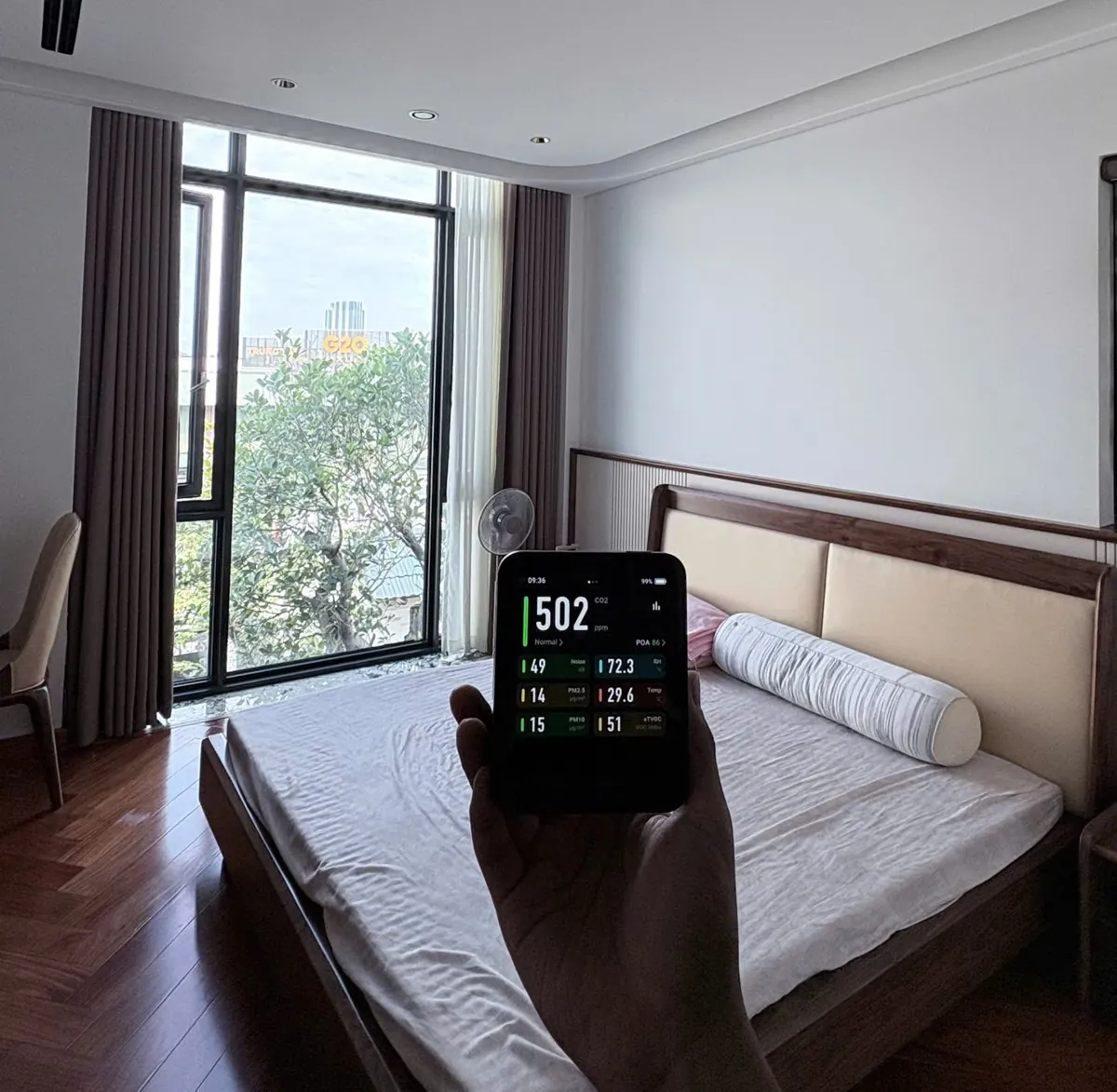 Indoor air quality monitor in a bedroom when assessing home fresh air system needs